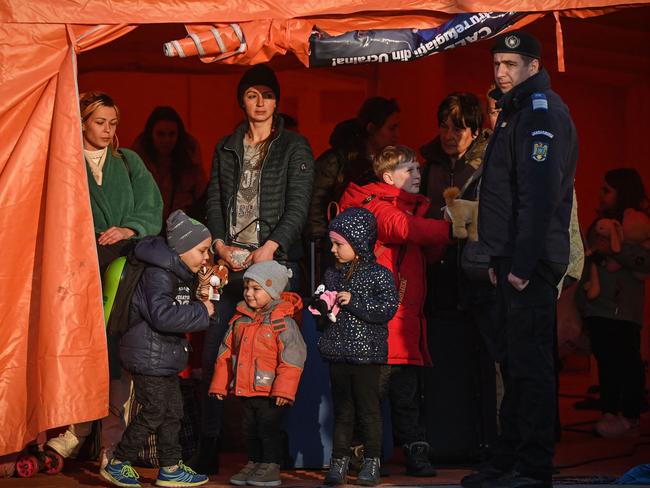 Refugees from Ukraine wait in a tent at the Romanian-Ukrainian border Isaccea-Orlivka. Picture: AFP