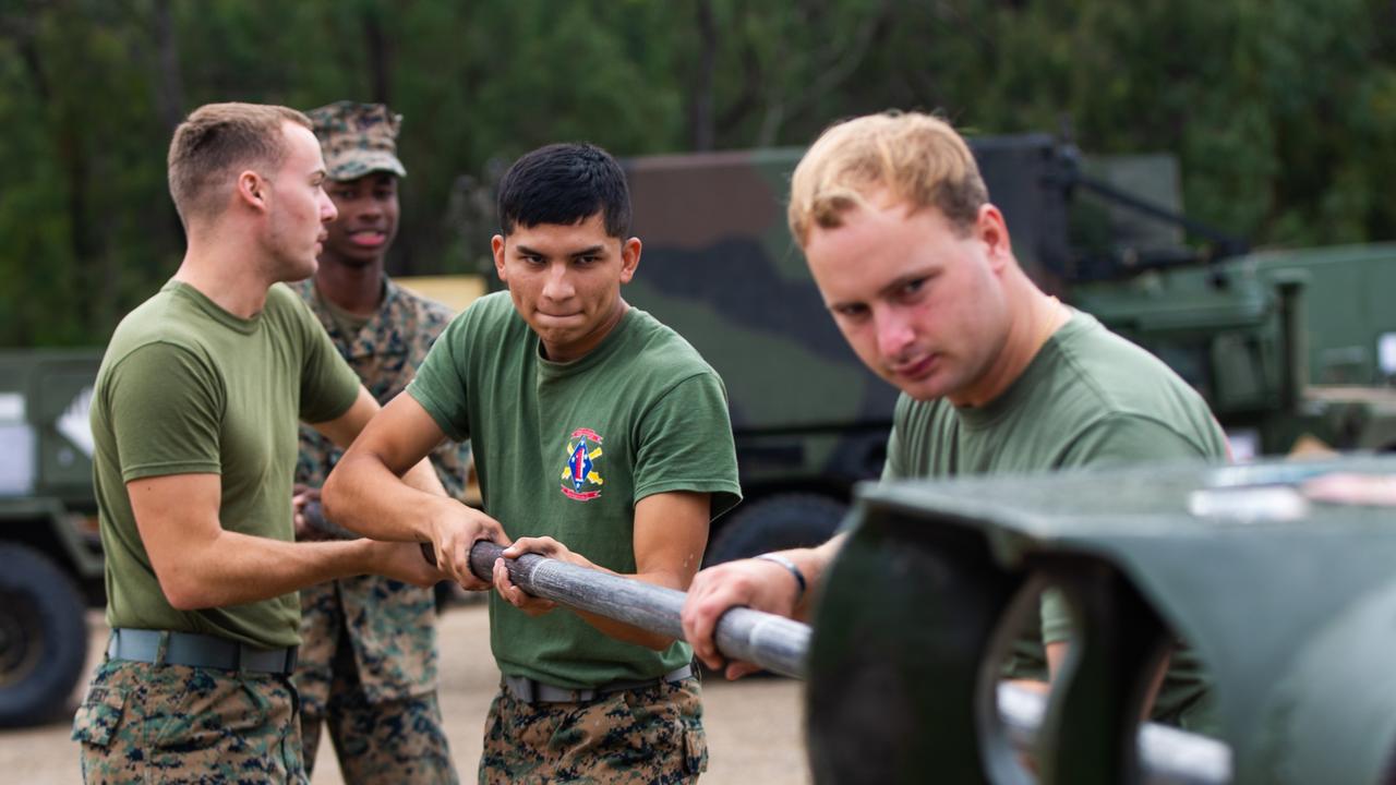 U.S. Marines with 3d Battalion, 12th Marines, 3d Marine Division, clean the tube of an M777A2 155mm Howitzer during Exercise Talisman Sabre 2021 on Shoalwater Bay Training Area in Queensland, Australia, July 14, 2021. TS21 is a large-scale, bilateral military exercise conducted biennially across Northern Australia designed to enhance the U.S.-Australia alliance which is an anchor of peace and stability in the Indo-Pacific. Exercises like this provide effective and intense training to ensure our forces are capable, interoperable, responsive, and combat-ready. (U.S. Marine Corps photo by Lance Cpl. Ujian Gosun)