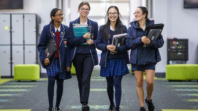Students at Avila College in Melbourne, from left, Melita Davis, Julia Augustyn, Linh Nguyen and Ashlyn Mamachan. Picture: Aaron Francis