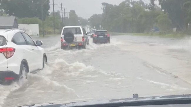 Flooding on Industrial Dr, Newcastle. Picture: Facebook/Kelly Vines.