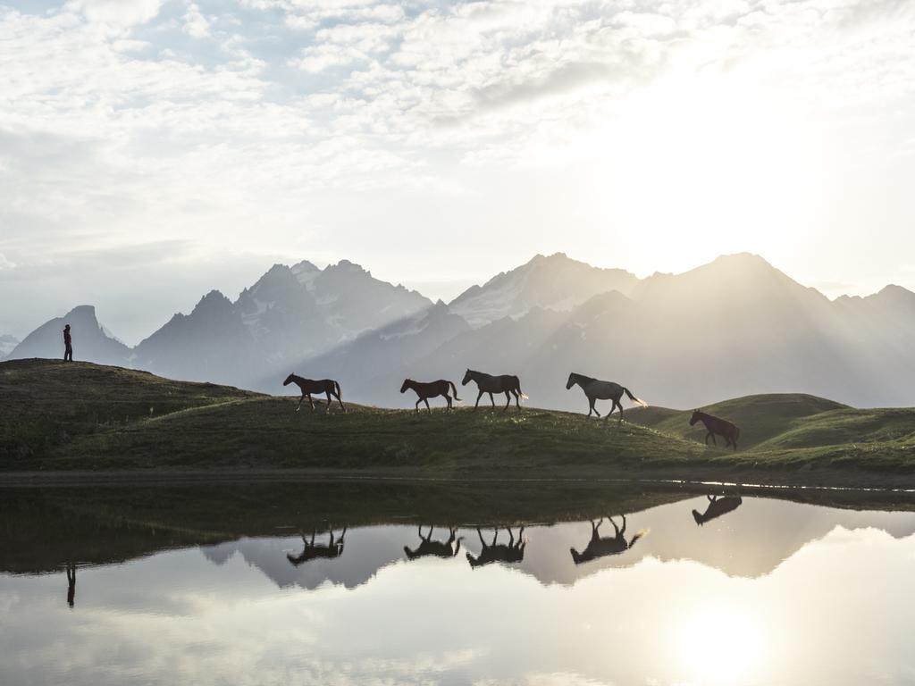 Photo by Witold Ziomek / National Geographic Nature Photographer of the Year contest. Sunrise Morning at Koruldi Lakes in Georgia (country).