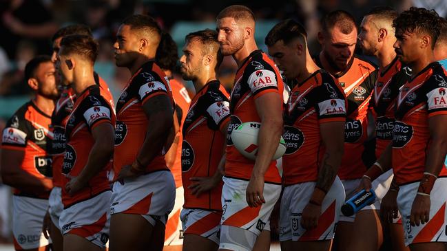 SYDNEY, AUSTRALIA - MARCH 05: Tigers players look on following a Titans try during the round one NRL match between the Wests Tigers and the Gold Coast Titans at Leichhardt Oval on March 05, 2023 in Sydney, Australia. (Photo by Cameron Spencer/Getty Images)