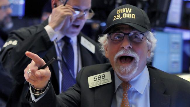 Trader Peter Tuchman wears his "Dow 29,000" hat as he works on the floor of the New York Stock Exchange. Picture: AP/ Richard Drew.