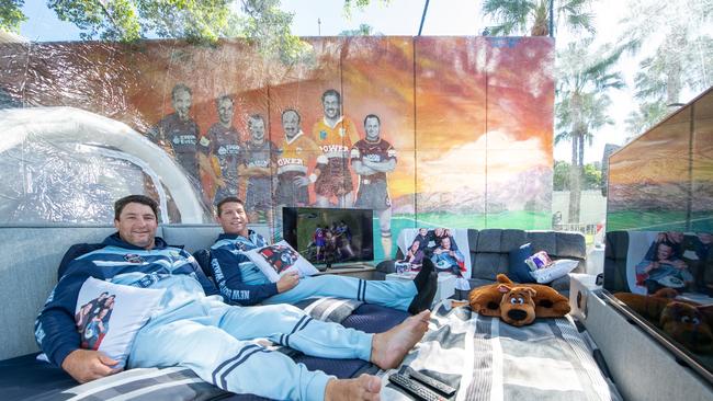 Nathan Hindmarsh and Brian Fletcher in their tent at Suncorp Stadium.