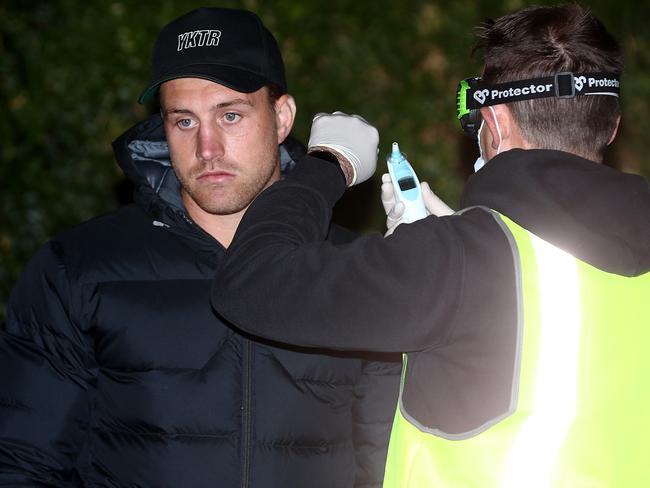 Cameron Munster has his temperature checked on arrival in Albury. Picture: Getty Images