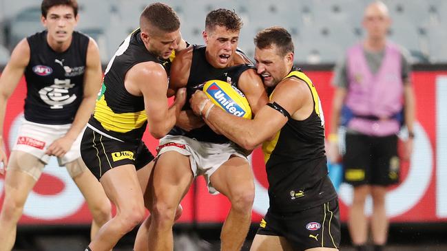 Richmond and Carlton clash in the opening game of the postponed AFL season.