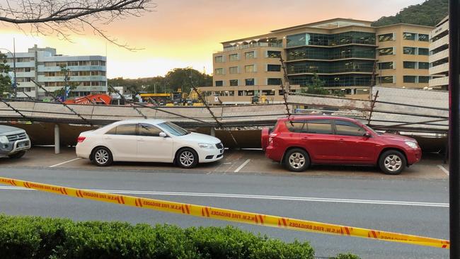 Scaffolding accident on Mann St in Gosford has seen eight cars and one ute crushed.  Picture: Richard Noone