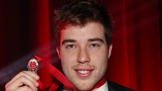 Zach Merrett wins the best and fairest for the Bombers at the 2019 Crichton Medal ceremony at the Melbourne Convention Centre in Melbourne, Tuesday, October 1, 2019. (AAP Image/David Crosling) NO ARCHIVING