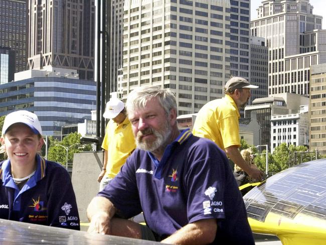 Melbourne. February 15, 2001. Former student Sarah Harris and science teacher David Edmonds take in Melbourne as the Australian Greenhouse Office SunRace 21.C enters the city.  The eight-day race started in Adelaide on 11 February and passes through many towns and cities before reaching Sydney on Sunday 23 February. (AAP Image/Julian Smith)