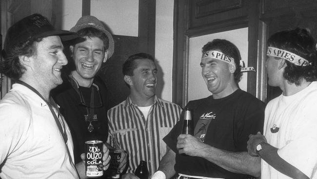 Crosisca (second from left) celebrating Collingwood’s 1990 premiership with teammates Graham Wright Tony Shaw, Darren Millane and Sean Millane.