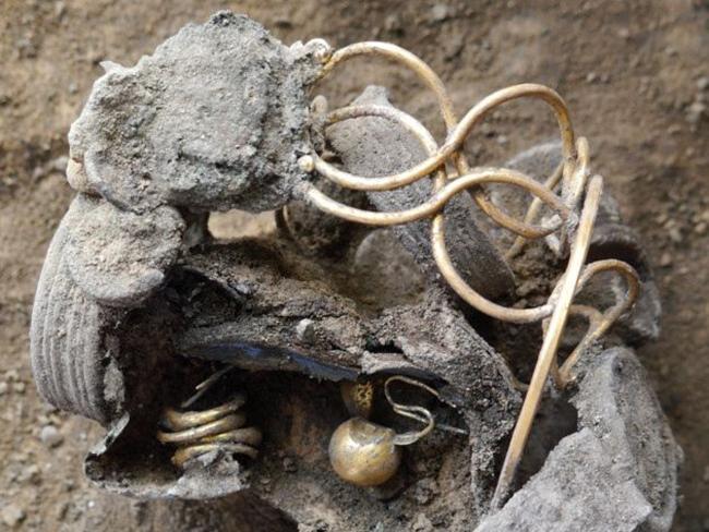 The Colchester hoard ... Hidden among a food store, this stash of gold and silver jewellery highlights the plight of the Roman women sacrificed after the city fell. Source: Supplied