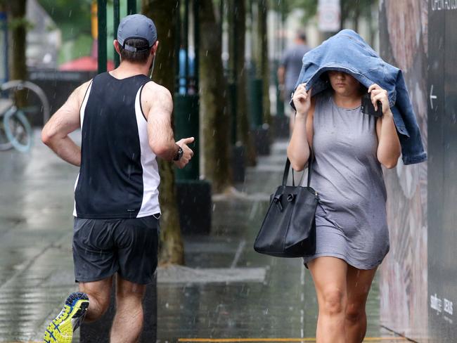 A thunderstorm hit Melbourne on Monday afternoon after a top of 35C. Picture: Norm Oorloff