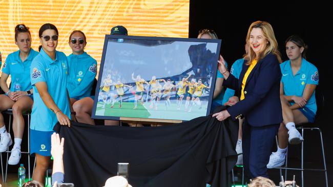 Sam Kerr and Premier Annastacia Palasczcuk unveil the image that will become a statue of the Matildas at Suncorp Stadium. Picture Lachie Millard