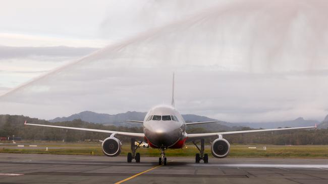 A Jetstar plane landing at Gold Coast Airport.