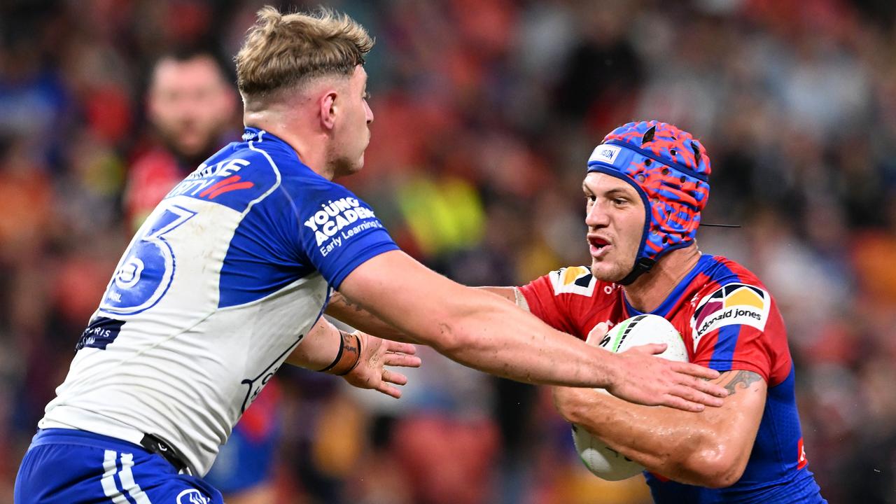 Kalyn Ponga of the Knights takes on the defence. Photo by Bradley Kanaris/Getty Images