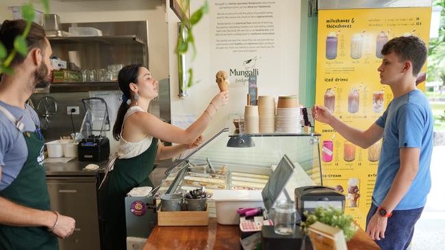 Jay Sanseury and Emy Moch serving customers at the ever-popular Dairy By Mungalli in Shields Street, Cairns. Picture: Nuno Avendano