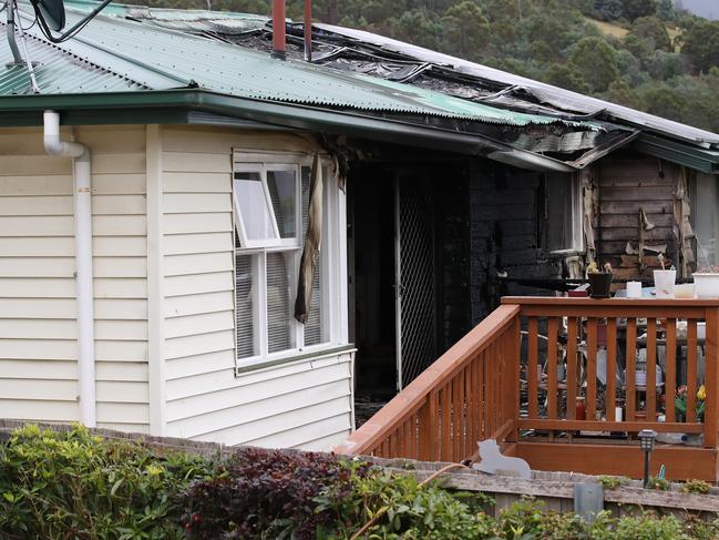 Members of the Tasmanian Police and Tasmania Fire Service attend the scene at Oakbank Avenue, Montrose where a fire occurred last night.  Picture: Zak Simmonds