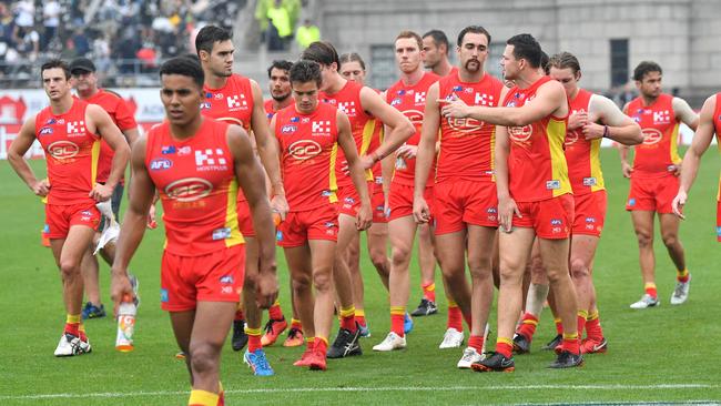 Gold Coast walk off after losing to Port Adelaide in China.