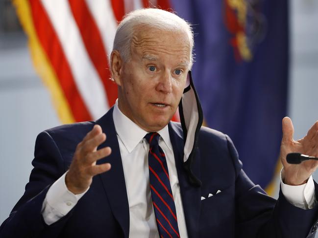 Democratic presidential candidate, former Vice President Joe Biden, claims Mr Trump would have to be escorted from the White House. Picture: Matt Slocum