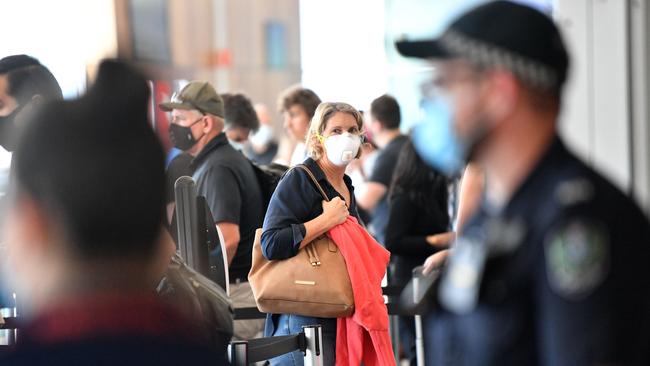 Travellers arriving from Sydney at Adelaide Airport. Picture: NCA NewsWire / David Mariuz