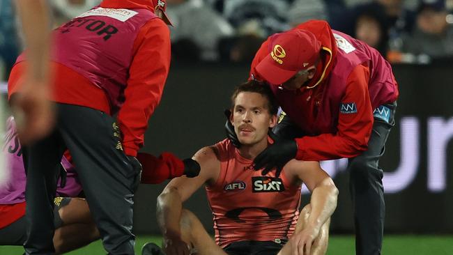 GEELONG, AUSTRALIA - JUNE 07: Noah Anderson of the Suns is s seen after a collision with Tom Atkins of the Cats during the round 13 AFL match between Geelong Cats and Gold Coast Suns at GMHBA Stadium, on June 07, 2025, in Geelong, Australia. (Photo by Robert Cianflone/Getty Images)