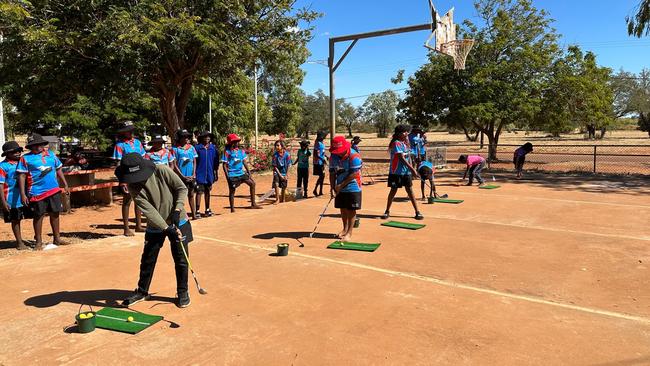 Students giving golf a crack in remote communities. Picture: Supplied