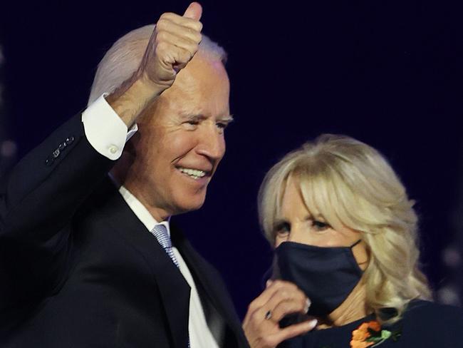 WILMINGTON, DELAWARE - NOVEMBER 07: President-elect Joe Biden and Jill Biden wave to the crowd after Biden's address to the nation from the Chase Center November 07, 2020 in Wilmington, Delaware. After four days of counting the high volume of mail-in ballots in key battleground states due to the coronavirus pandemic, the race was called for Biden after a contentious election battle against incumbent Republican President Donald Trump.   Tasos Katopodis/Getty Images/AFP == FOR NEWSPAPERS, INTERNET, TELCOS & TELEVISION USE ONLY ==