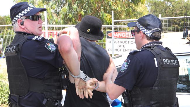 Black Swan Lake protest at Bundall goes to another level, with protesters chaining themselves to the fence and then getting themselves arrested after running onto the worksite and stopping the trucks. Protester known only as 