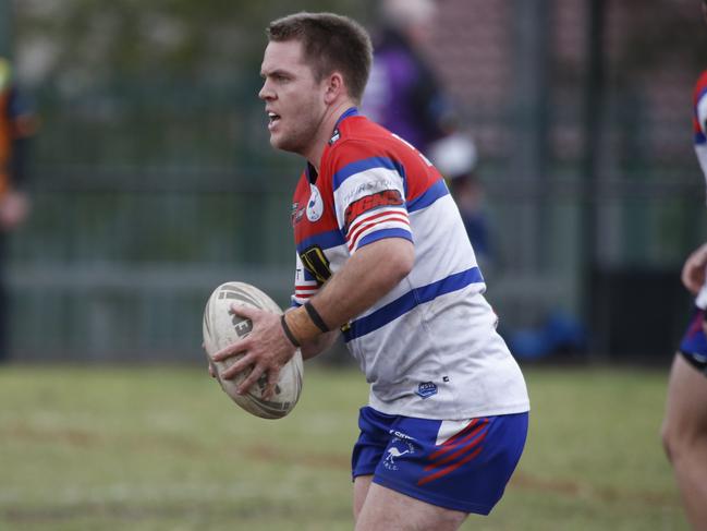 Billy Hayes has a run for Emu Plains. Picture Warren Gannon Photography