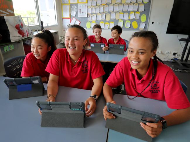 12/12/2018: Camberwell Primary School Year 6 students Rhea, Grace, Kayleigh, James & Brando on their iPads. Camberwell uses 1:1  iPads from Year 2 and is looking to take its digital literacy education to the next level. Stuart McEvoy/The Australian.