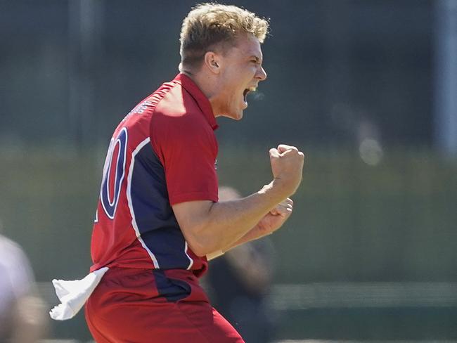 Premier Cricket: Melbourne v Dandenong. Jack Prestwidge bowling for Melbourne celebrates the wicket of Brett Forsyth. Picture: Valeriu Campan