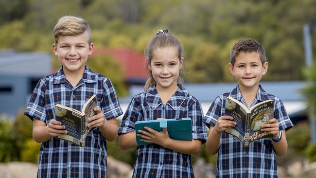 Assisi Catholic College students, Ethan Naimo, 10, April McFaul, 8, and Mariusz Hall, 9. Picture: Jerad Williams