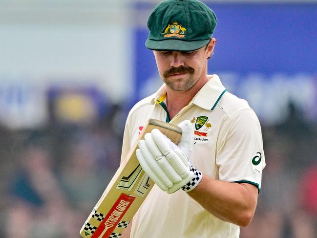 Australia's vice captain Travis Head walks back to the pavilion after his dismissal during the first day of the first Test cricket match between Sri Lanka and Australia at the Galle International Cricket Stadium in Galle on January 29, 2025. (Photo by Ishara S. KODIKARA / AFP)