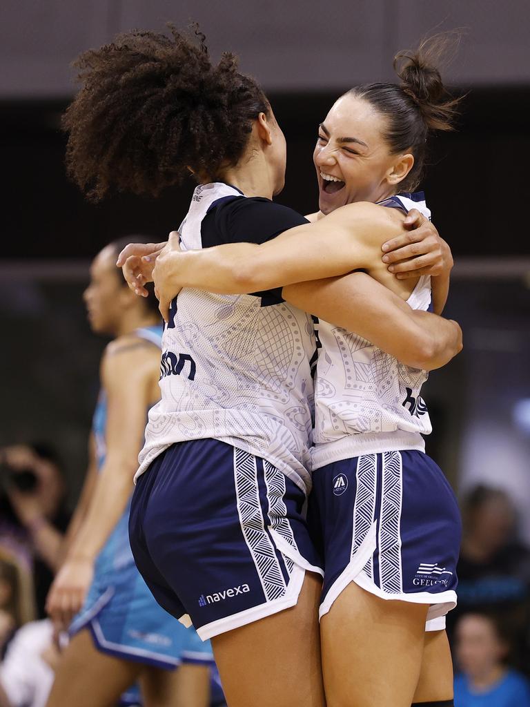 Monique Conti (right) celebrates with Haley Jones after shooting the matchwinning basket in overtime against Southside Flyers. Picture: Daniel Pockett/Getty Images