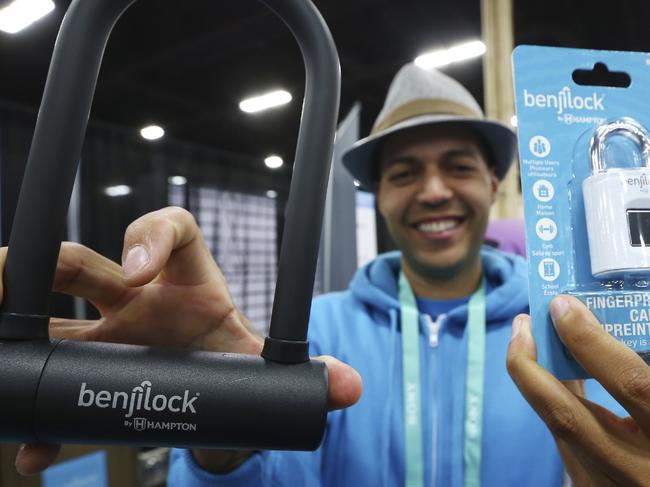 Benjilock founder Robbie Cabral shows off his joint venture with Hampton for key and fingerprint recognition locks at the CES Unveiled media preview event, Sunday, Jan. 5, 2020, in Las Vegas. (AP Photo/Ross D. Franklin)