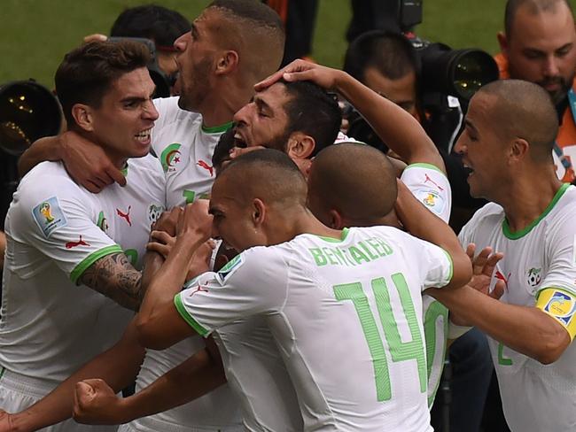 The Algerians celebrate one of their four goals (so far).