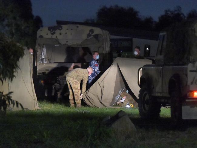 The military sets up tents outside Epping Gardens Nursing Home last night. Picture: Tony Gough