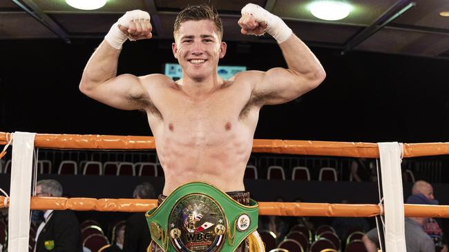 Jackson Griffiths celebrates his WBC Australasia Grand Champion title win.