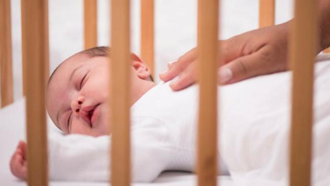 Baby sleeping in outlet cold room