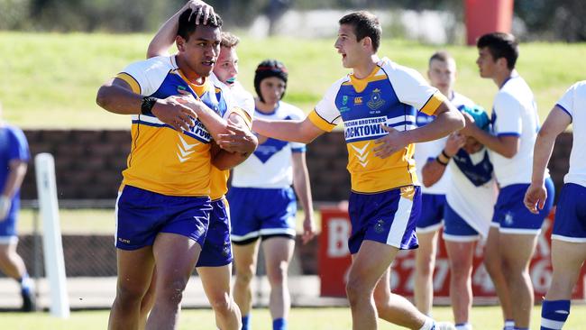 David Langi barged across for a four-pointer for Patrician Brothers Blacktown Picture: Jonathan Ng