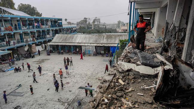 Israel carries out a deadly strike at a UN school, killing dozens of women and children. Picture: AFP