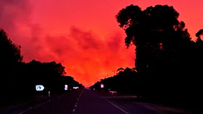 The sky turns red near Loch Sport as residents are told it’s too late to leave. Picture: Berrys Creek CFA/Facebook