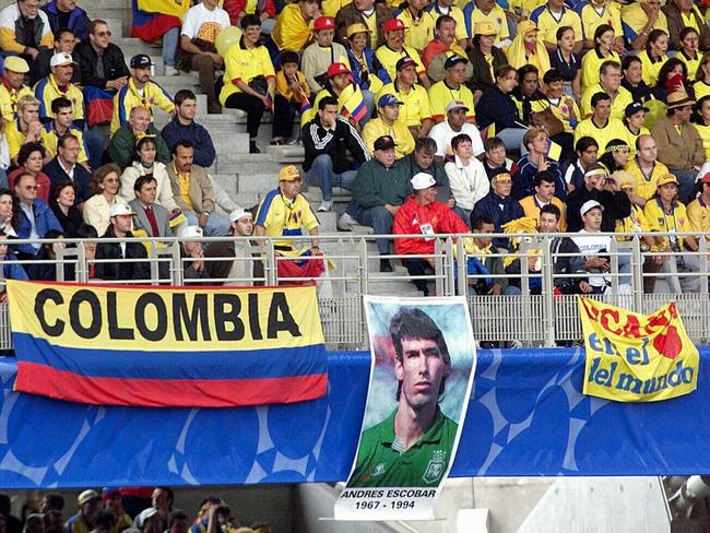 Colombia fans unfurl photo of late hero Andres Escobar.