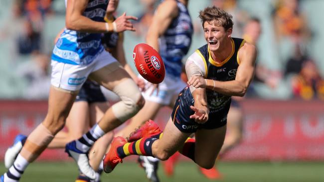 Crow Matt Crouch dishes out a handball against Geelong. Picture: Matt Turner/AFL Photos via Getty Images