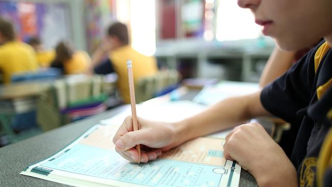 Patricks Road State School students sit the NAPLAN test (taken in 2015). Pictures: Jack Tran / The Courier Mail