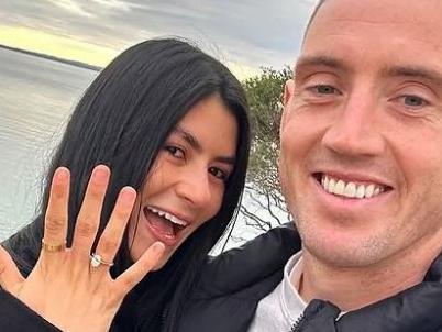 Collingwood's Darcy Cameron and his partner Adriana are engaged.
