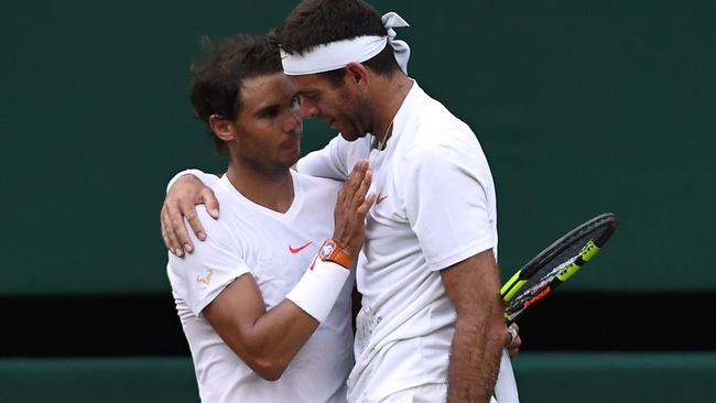 Sportsmanship at its finest. Nadal hugs Del Portro after their five-set thriller