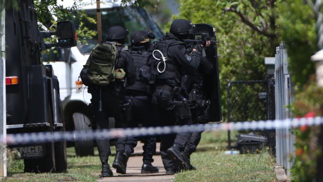 Queensland Police putting an end to a 22-hour siege at a house in Inala in late 2014. The suburb has cleaned up its act in crime statistics lately, though still about double that of blue chip areas. Picture: Jack Tran / The Courier Mail