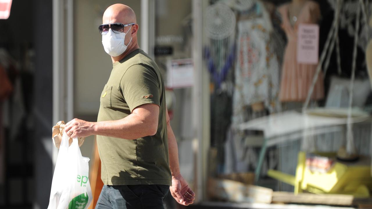 NSW residents should wear a mask if they want to and are in areas of possible high transmission such as on public transport. Picture: Simon Bullard/AAP