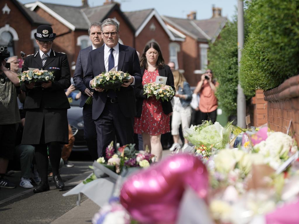 ’How many more?’: British Prime Minister Sir Keir Starmer was confronted at the site of the UK stabbing. Picture: AFP